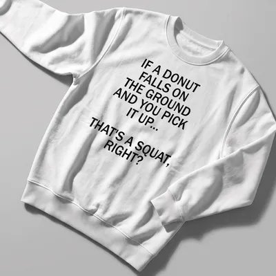 Bold typography shirt with humorous donut squat saying — printed on a unisex sweatshirt