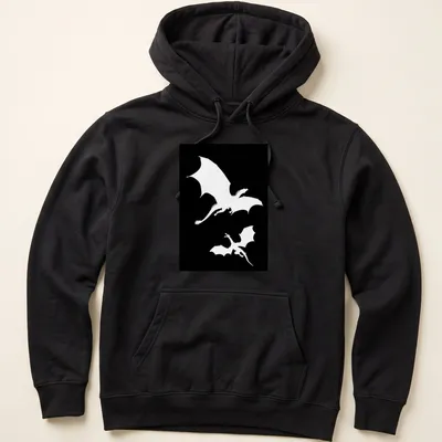 Silhouette design of two dragons flying against a black and white backdrop — printed on a unisex hoodie