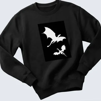 Silhouette design of two dragons flying against a black and white backdrop — printed on a unisex sweatshirt