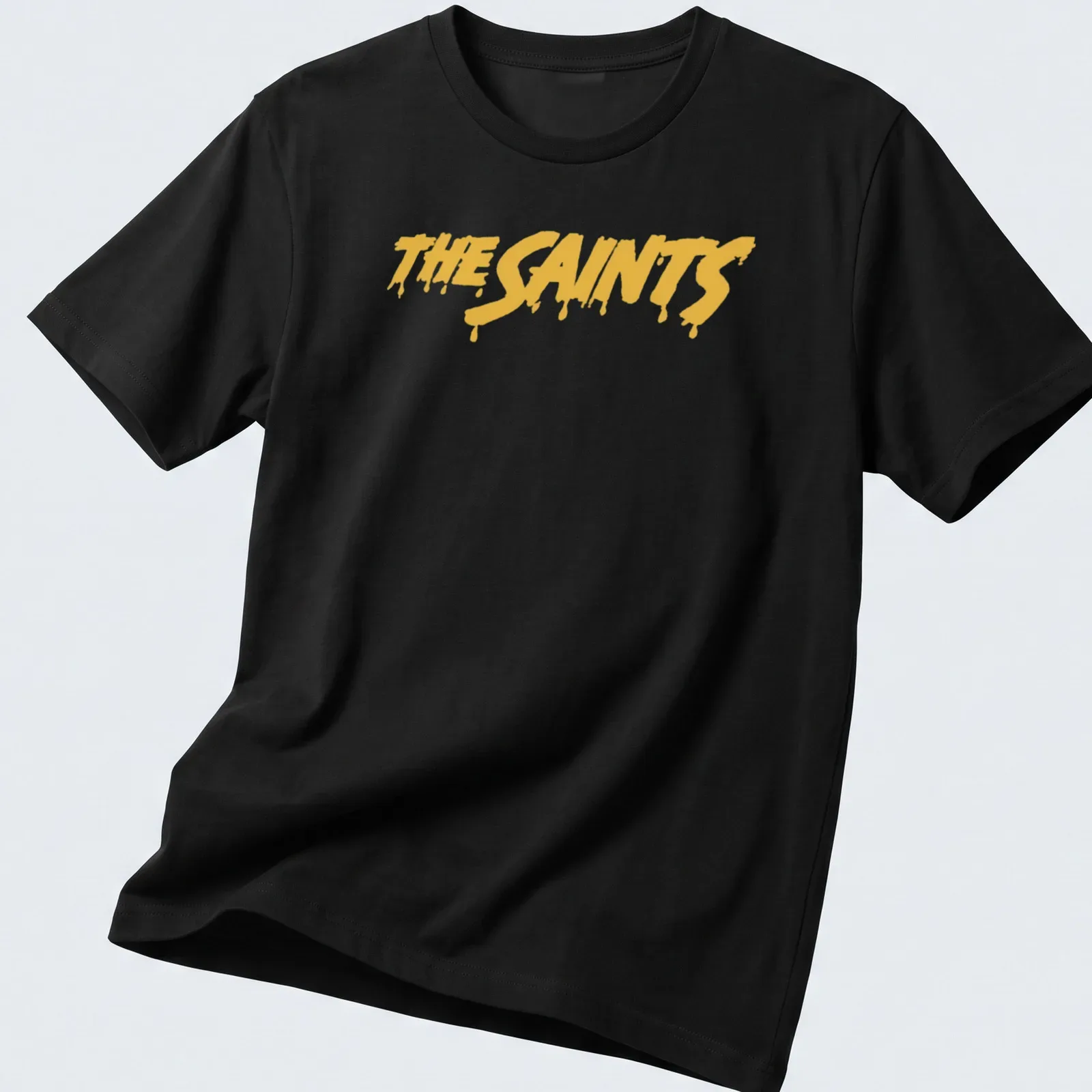 Bold yellow dripping paint typography on black shirt reading The Saints — printed on a unisex t-shirt