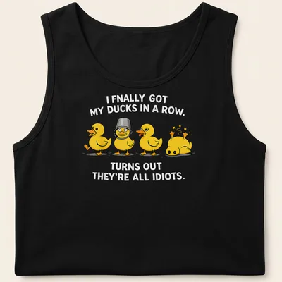 Cartoon ducks humorously illustrated, with text about getting ducks in a row. — printed on a tank top