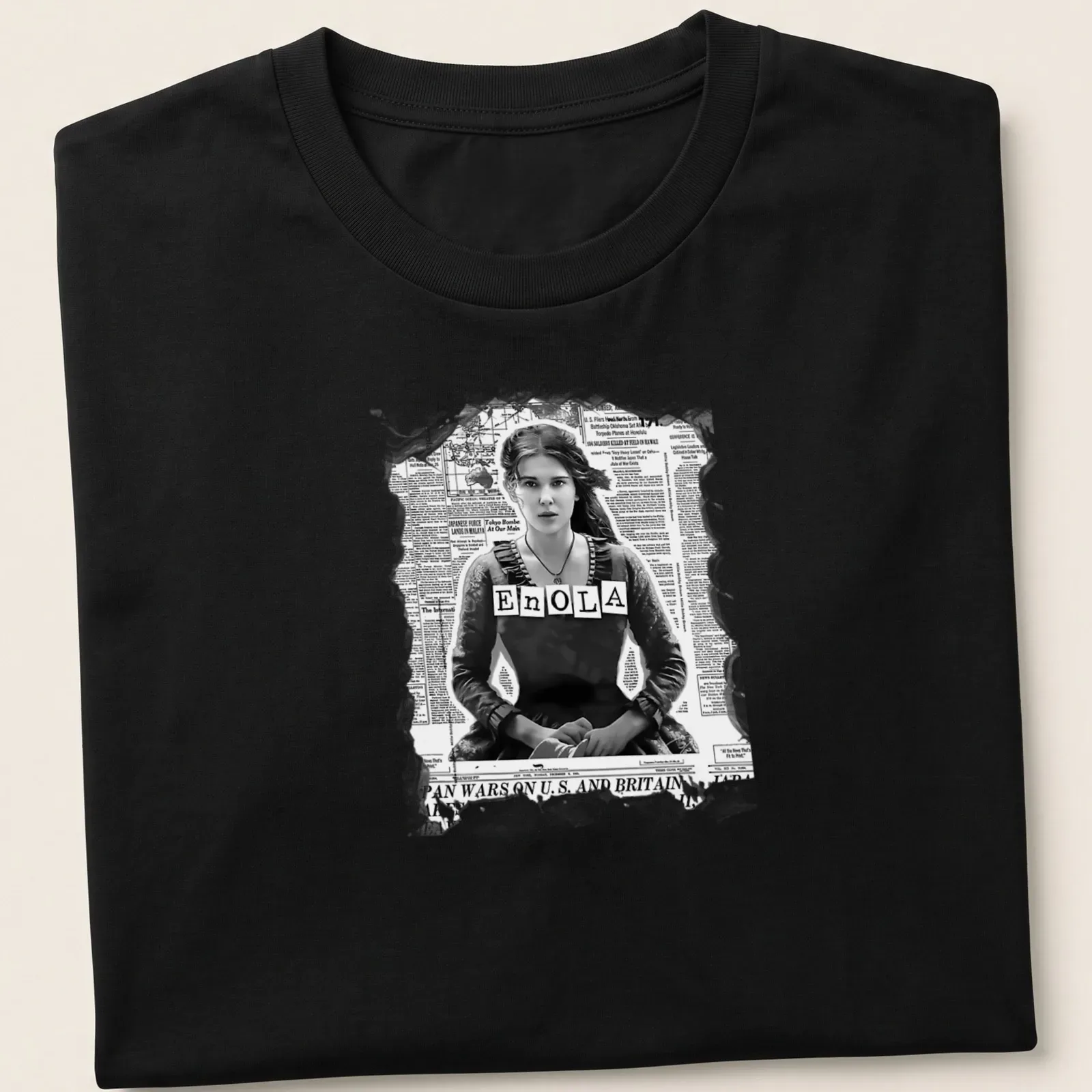 Vintage newspaper style Enola Holmes graphic with black and gray colors — printed on a unisex t-shirt