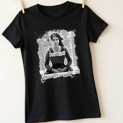 Vintage newspaper style Enola Holmes graphic with black and gray colors — printed on a women's shirt