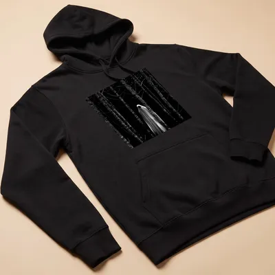 Gothic horror graphic of a faceless ghost in a dark forest in black and white — printed on a unisex hoodie