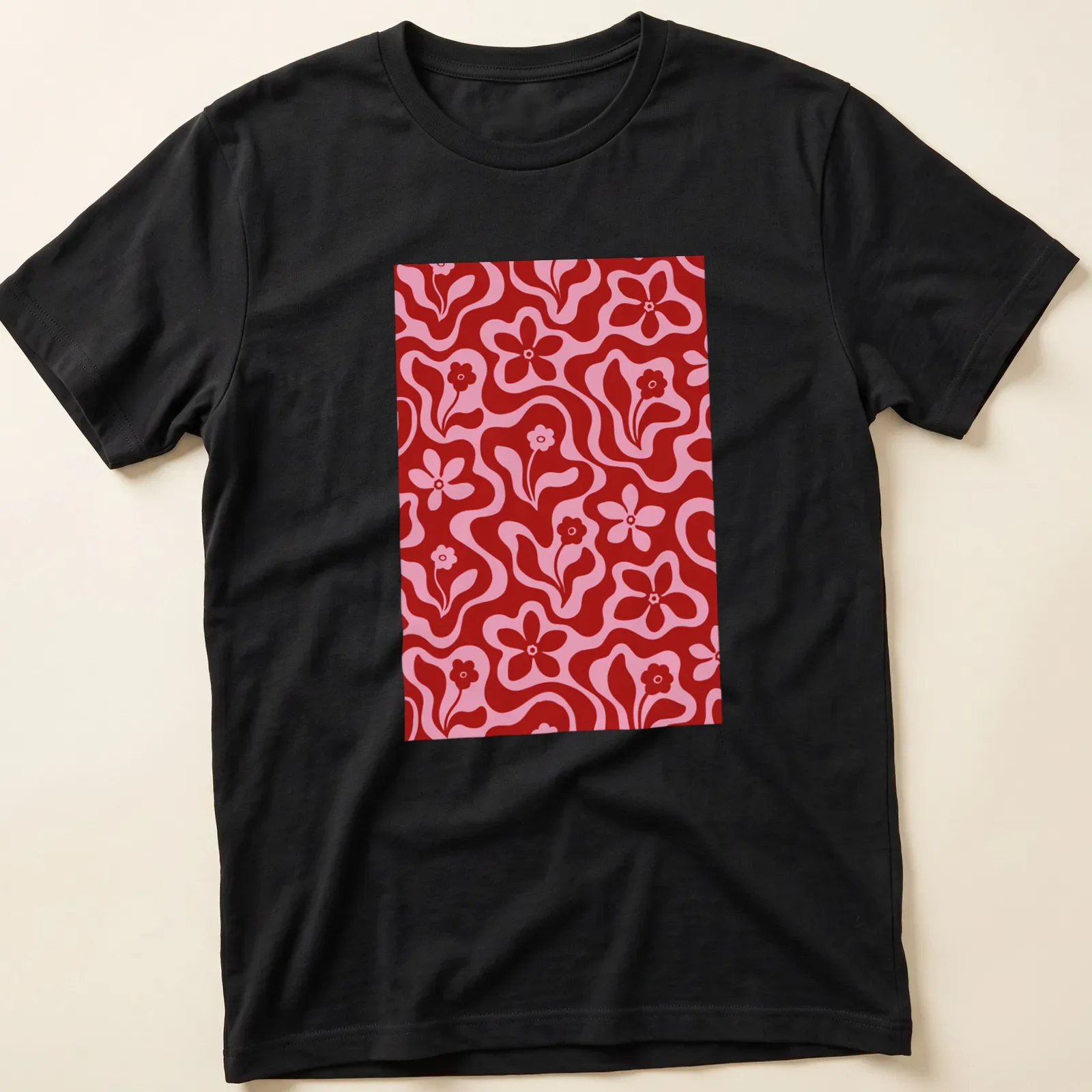 Retro floral pattern in red and pink on a T-shirt featuring flowers — printed on a unisex t-shirt