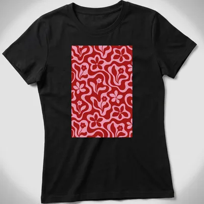 Retro floral pattern in red and pink on a T-shirt featuring flowers — printed on a women's shirt