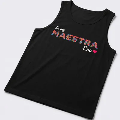 Colorful floral design with the text 'In my MAESTRA Era' — printed on a tank top