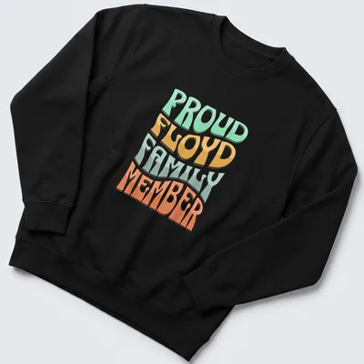 Playful typography design proclaiming Proud Floyd Family Member in bright colors — printed on a unisex sweatshirt