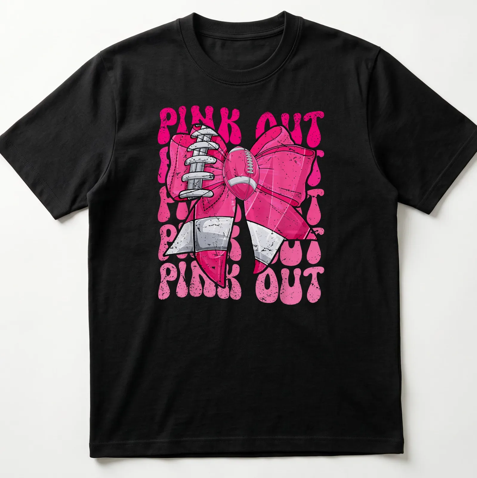 Bold graphic of a football bow with 'PINK OUT' text for breast cancer awareness — printed on a unisex t-shirt