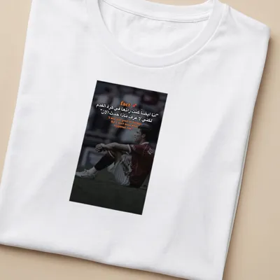 Dramatic football player t-shirt with a quote about past greatness in red, black, and white — printed on a women's shirt