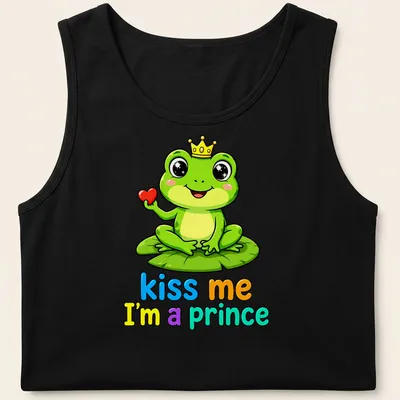 Kawaii frog prince on lily pad with colorful text "kiss me I'm a prince" — printed on a tank top