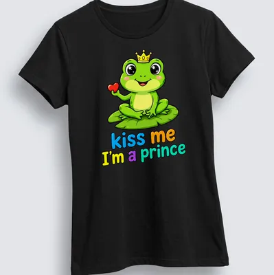 Kawaii frog prince on lily pad with colorful text "kiss me I'm a prince" — printed on a women's shirt