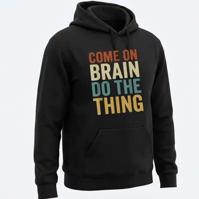 Retro t-shirt with a funny ADHD quote and a graphic of a brain in vibrant colors — printed on a unisex hoodie
