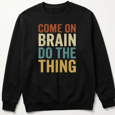Retro t-shirt with a funny ADHD quote and a graphic of a brain in vibrant colors — printed on a unisex sweatshirt