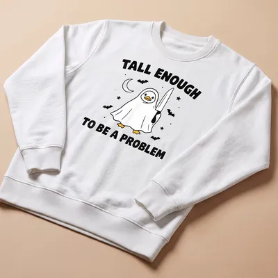 Cartoon duck in a ghost costume with humorous text — printed on a unisex sweatshirt