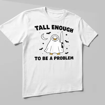 Cartoon duck in a ghost costume with humorous text — printed on a unisex t-shirt (angled view)