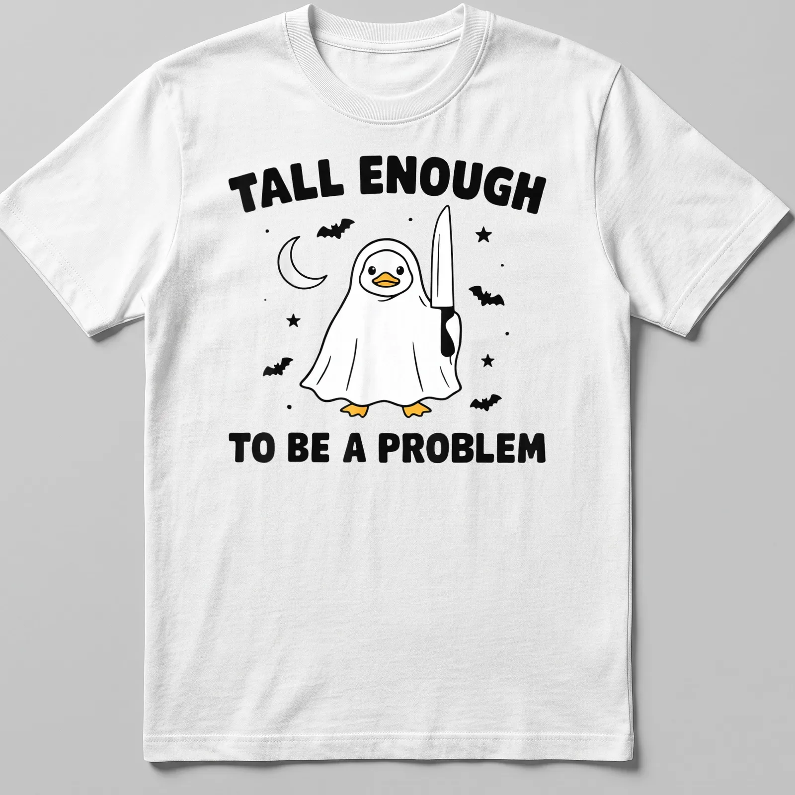 Cartoon duck in a ghost costume with humorous text — printed on a unisex t-shirt
