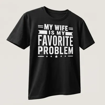 Bold typography t-shirt stating 'MY WIFE IS MY FAVORITE PROBLEM' in white — printed on a unisex t-shirt (angled view)