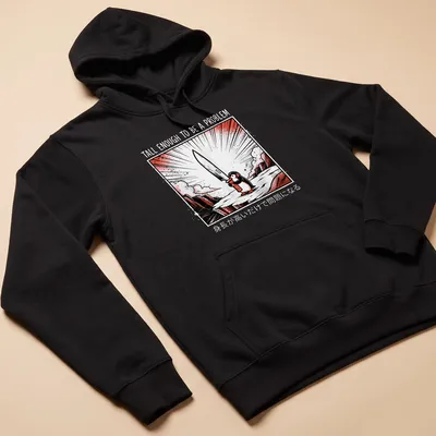 Comic-style penguin holding a knife with bold text in black, red, and white — printed on a unisex hoodie
