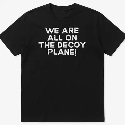 Bold text shirt with the phrase 'We Are All On The Decoy Plane!' in white.