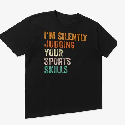 Bold retro t-shirt with the quote judging sports skills in vibrant colors. — printed on a unisex t-shirt (angled view)