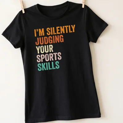 Bold retro t-shirt with the quote judging sports skills in vibrant colors. — printed on a women's shirt