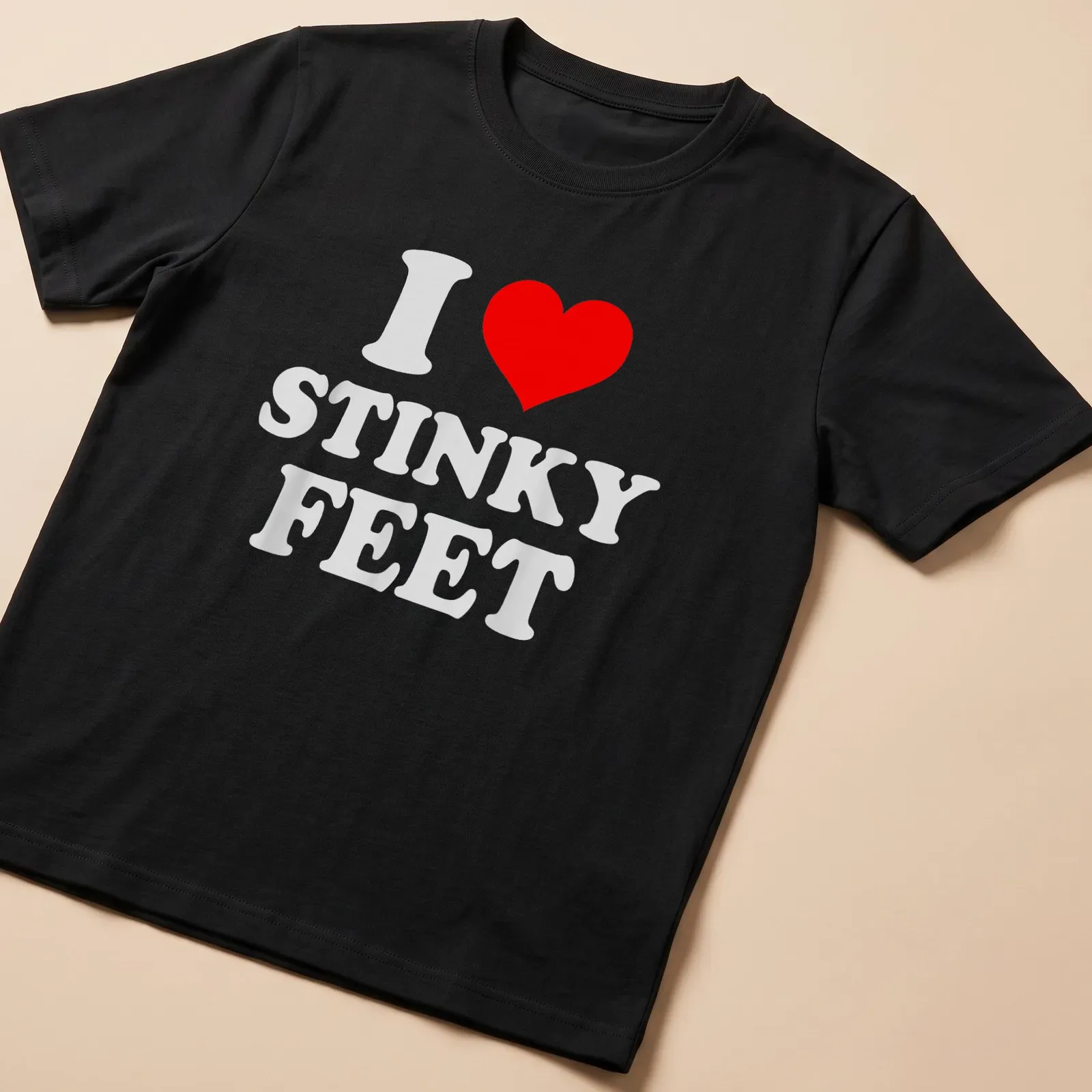 Bold typography tee with the phrase 'I Love Stinky Feet' and cartoon feet design. — printed on a unisex t-shirt