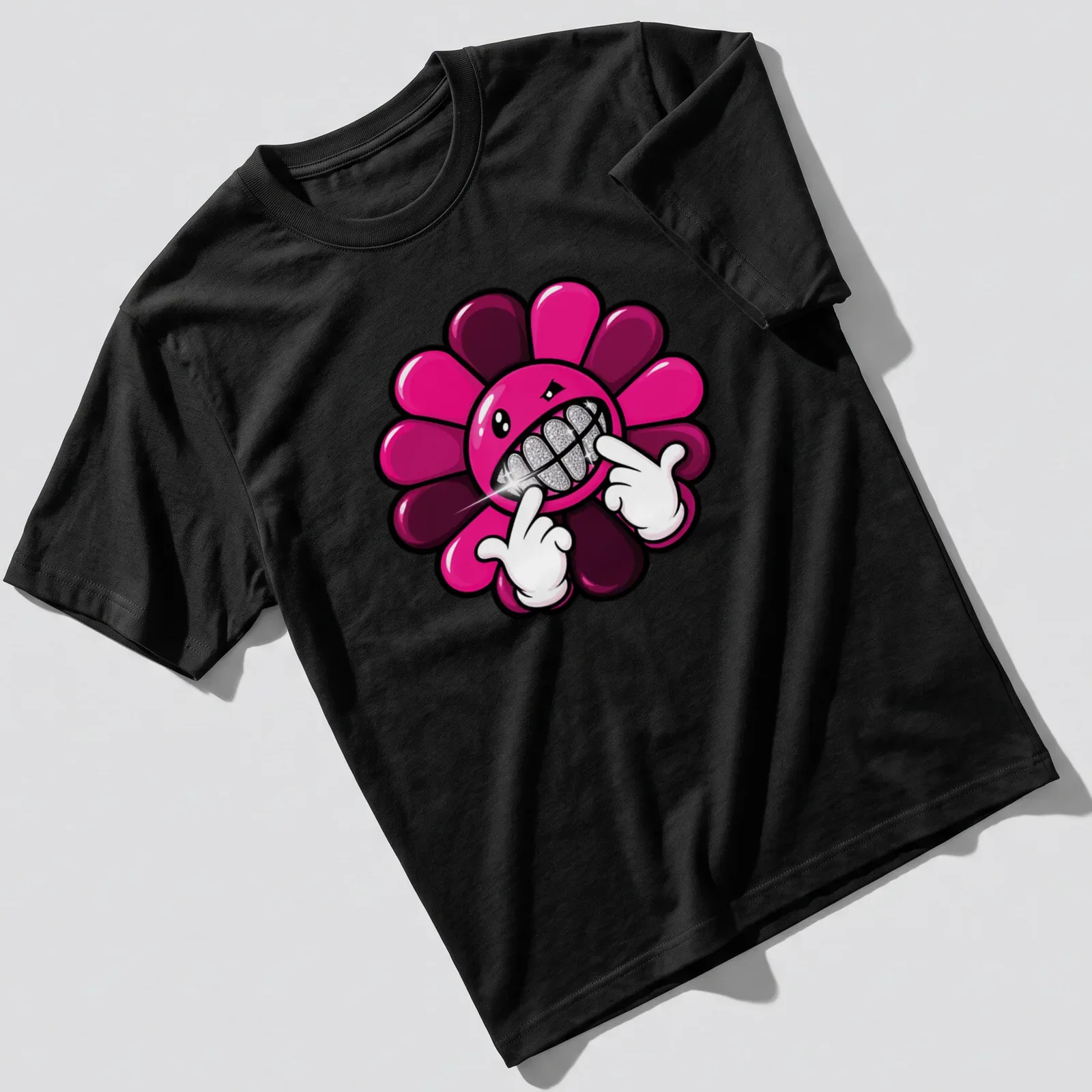 Cartoonish flower with a grinning face and text Gangsta Flower in pink, black, and silver. — printed on a unisex t-shirt