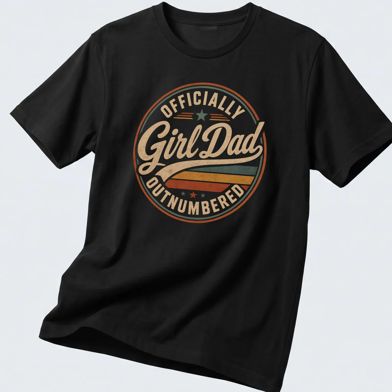 Retro distressed Girl Dad t-shirt with colorful text proclaiming 'Officially Outnumbered' — printed on a unisex t-shirt