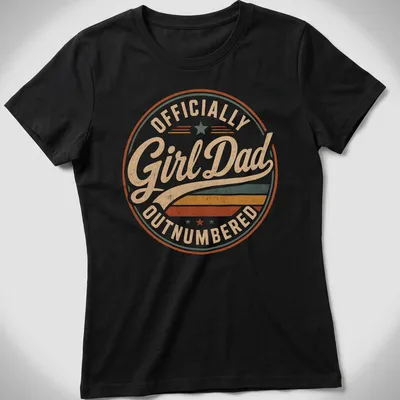 Retro distressed Girl Dad t-shirt with colorful text proclaiming 'Officially Outnumbered' — printed on a women's shirt
