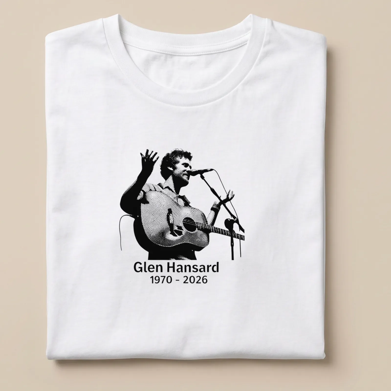 Halftone illustration of Glen Hansard with acoustic guitar, black and white design — printed on a unisex t-shirt