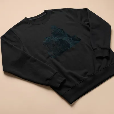 Weathered graphic of a Gothic Victorian mansion with bats in blue and black — printed on a unisex sweatshirt