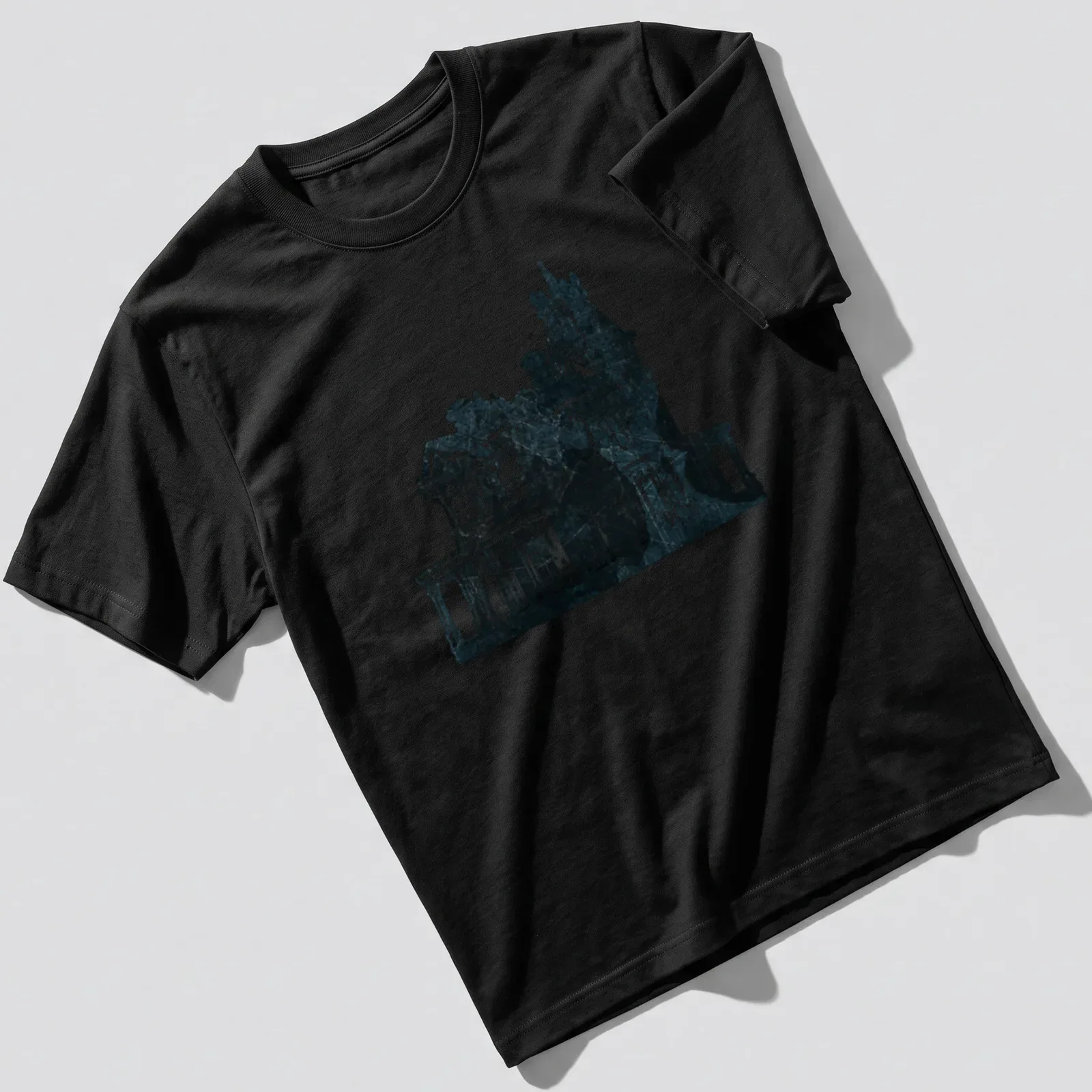 Weathered graphic of a Gothic Victorian mansion with bats in blue and black — printed on a unisex t-shirt