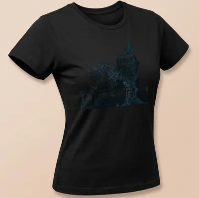 Weathered graphic of a Gothic Victorian mansion with bats in blue and black — printed on a women's shirt