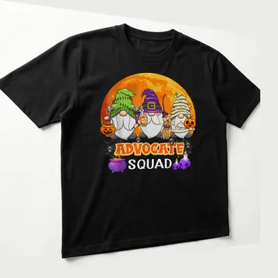 Cartoonish Halloween gnomes surrounding the text 'Advocate Squad' in vibrant colors — printed on a unisex t-shirt (angled view)
