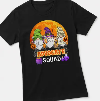 Cartoonish Halloween gnomes surrounding the text 'Advocate Squad' in vibrant colors — printed on a women's shirt