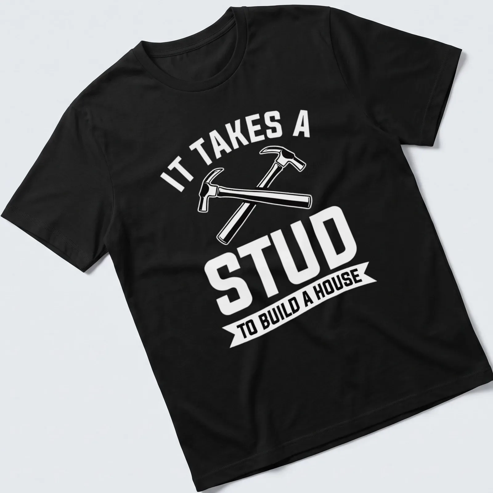 Bold graphic of crossed hammers and text about construction skills — printed on a unisex t-shirt