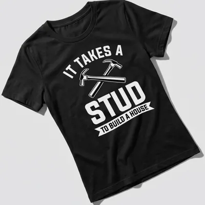 Bold graphic of crossed hammers and text about construction skills — printed on a women's shirt
