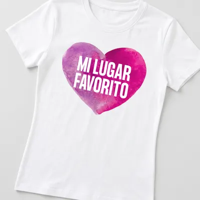 Watercolor heart graphic with the words 'MI LUGAR FAVORITO' in pink and purple — printed on a women's shirt