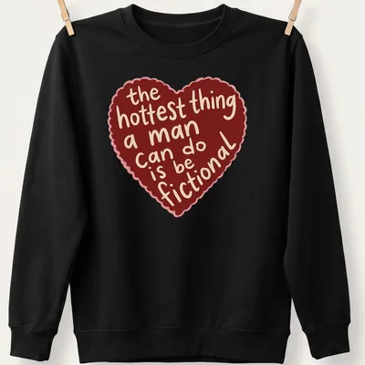 Cartoonish heart graphic with playful text about romance printed on a — printed on a unisex sweatshirt