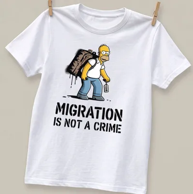 Cartoon print of Homer Simpson with the text Migration Is Not A Crime