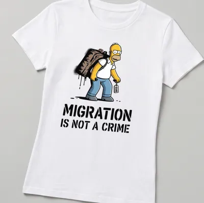 Cartoon print of Homer Simpson with the text Migration Is Not A Crime — printed on a women's shirt