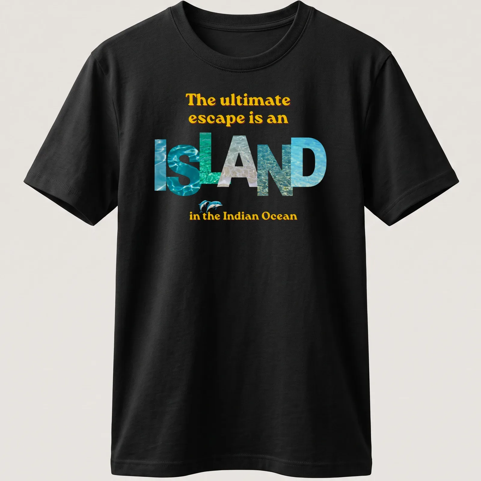 T-shirt with colorful typography reading 'The ultimate escape is an isLAND in the Indian Ocean' — printed on a unisex t-shirt
