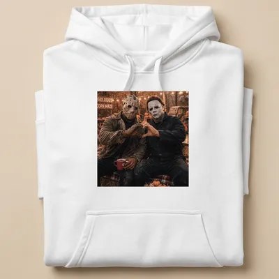Photographic print of Jason Voorhees and Michael Myers forming a heart with their hands — printed on a unisex hoodie