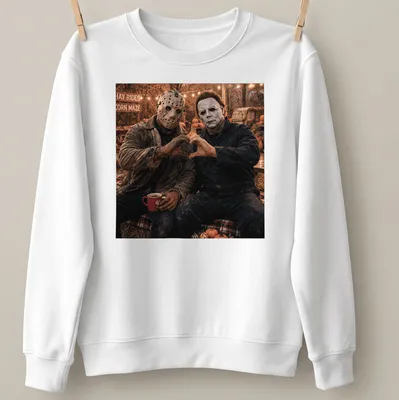 Photographic print of Jason Voorhees and Michael Myers forming a heart with their hands — printed on a unisex sweatshirt