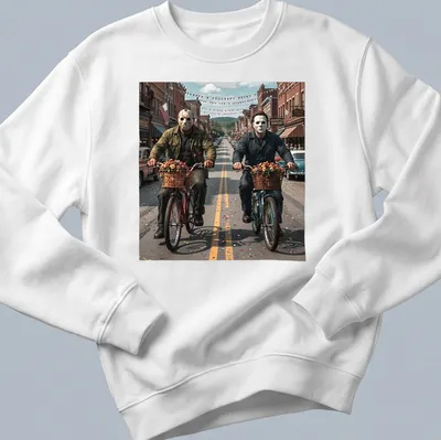 Realistic graphic of Jason Voorhees and Michael Myers riding bicycles in vibrant colors — printed on a unisex sweatshirt
