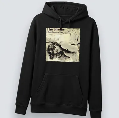 Artistic illustration of Jean Marais with The Smiths text in beige, gray, and white. — printed on a unisex hoodie