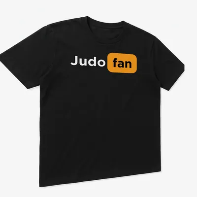 Bold typography Judo fan t-shirt in black, orange, and white — printed on a unisex t-shirt (angled view)