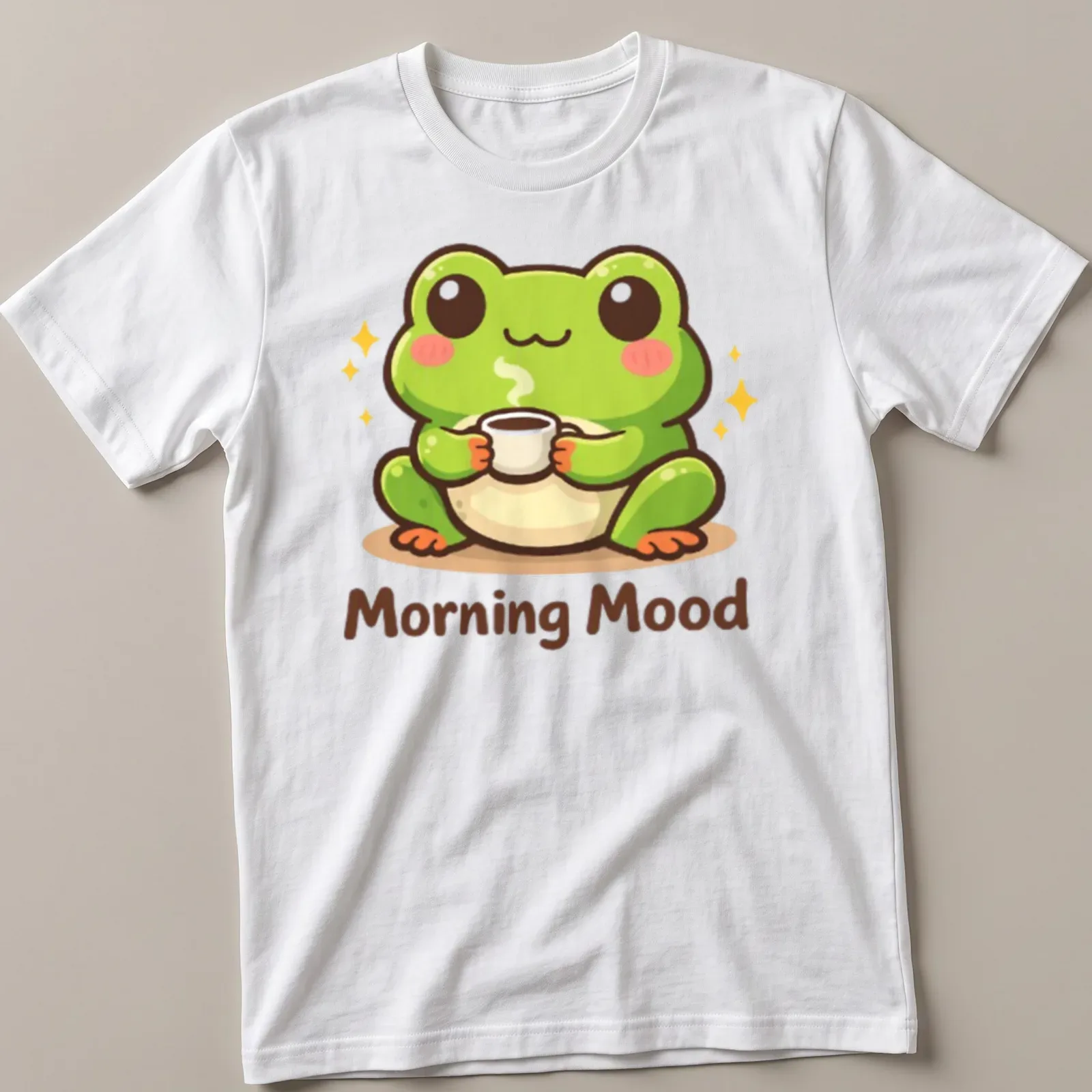 Kawaii frog holding a coffee cup with the text 'Morning Mood' above in playful colors — printed on a unisex t-shirt