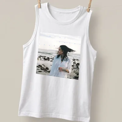 Photographic print of a woman by the beach with text 'blue water road' in blue and white — printed on a tank top
